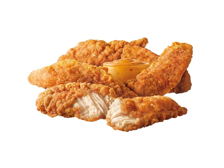 5 pieces of Sonic crispy tenders with a cup of dipping sauce on a white background.