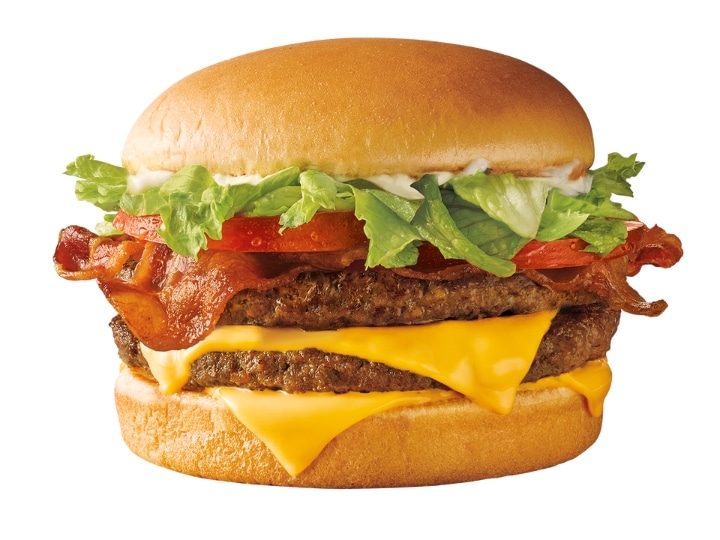 A supersonic bacon double cheeseburger on a white background.