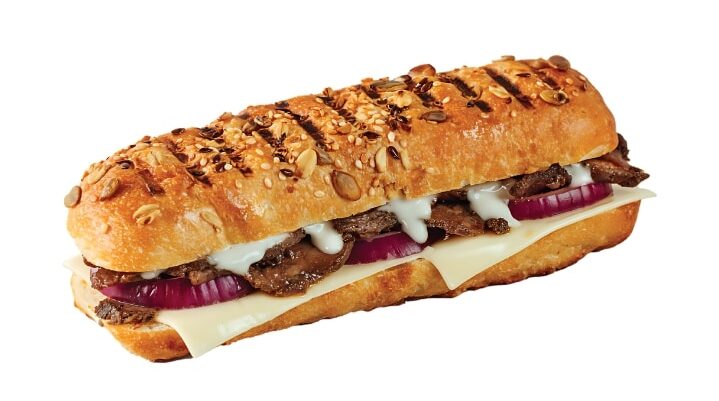 An image of a Tim Hortons steak and cheddar panini on a white background.