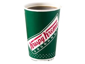 An image of a black coffee from Krispy Kreme in a paper cup on a white background.