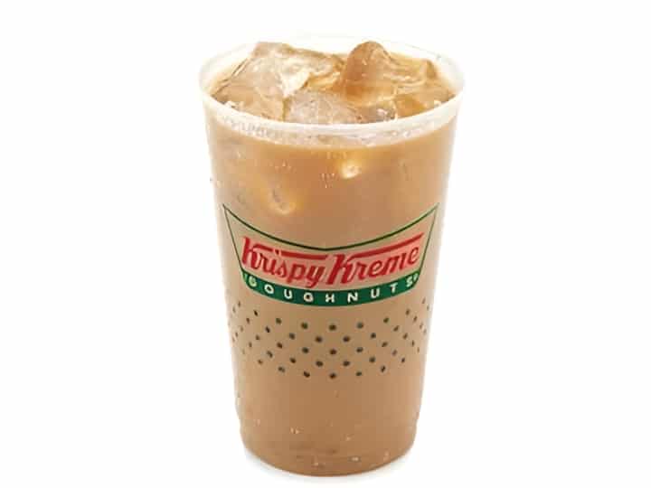 An image of an iced coffee from Krispy Kreme in a plastic cup on a white background.