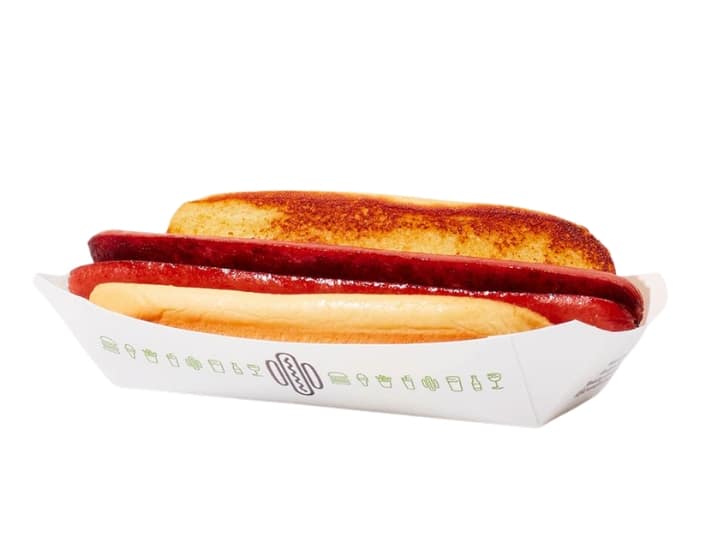 An image of a Shake Shack hot dog on a white background.