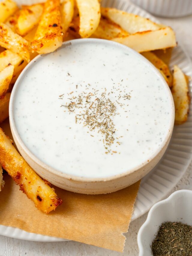 Seasoned french fries and cottage cheese ranch dip.