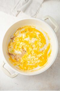 Cottage cheese omelet cooking in a pot.