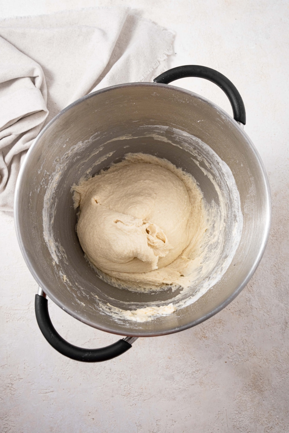 Combined bread dough in a large pot.