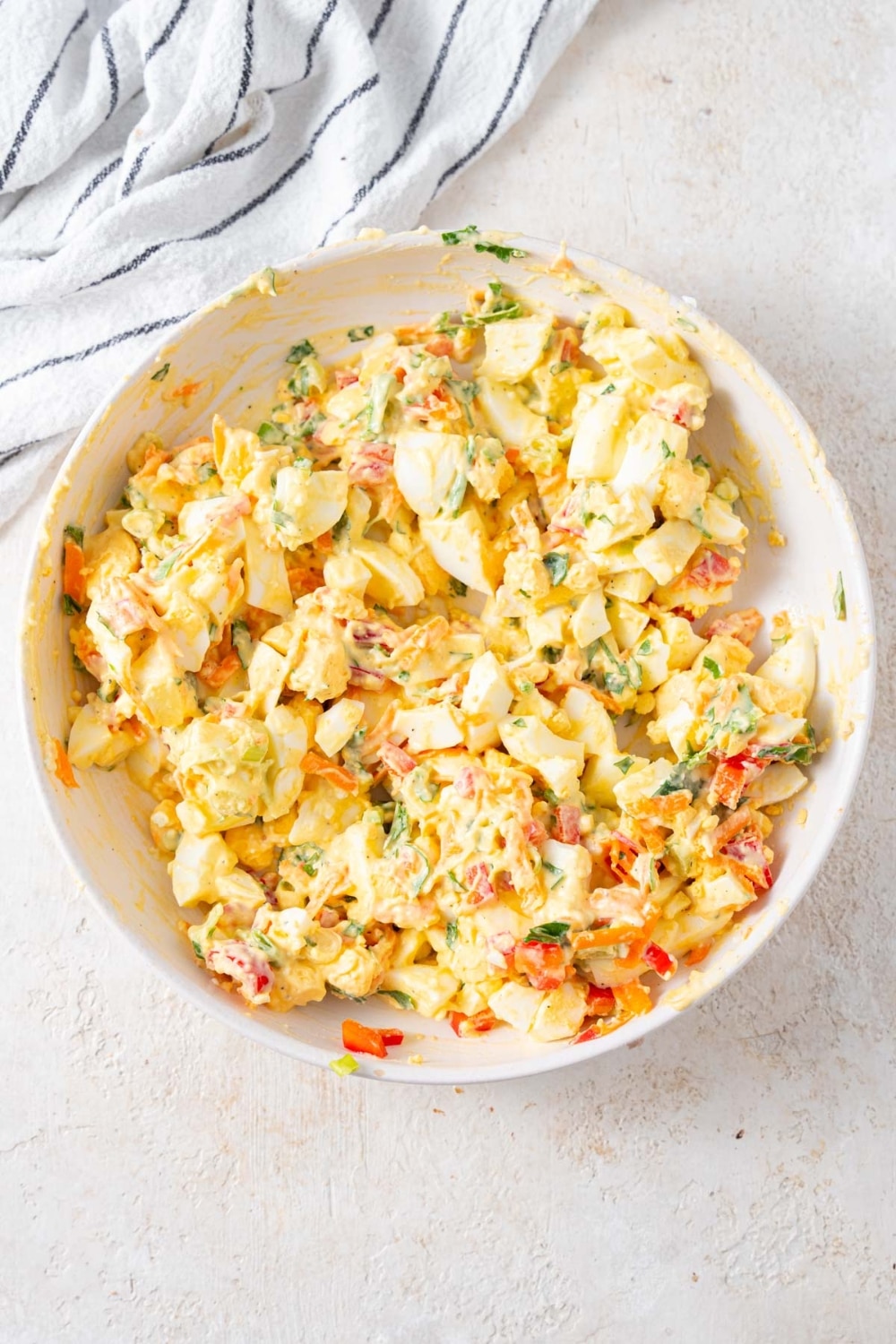 Cottage cheese egg salad mixed together in a bowl.